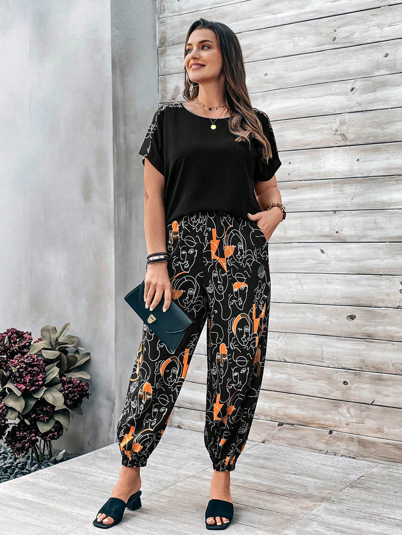 EMERY ROSE Plus Size Women's Batwing Sleeve Top And Abstract Face Print Pants Two-Piece Set