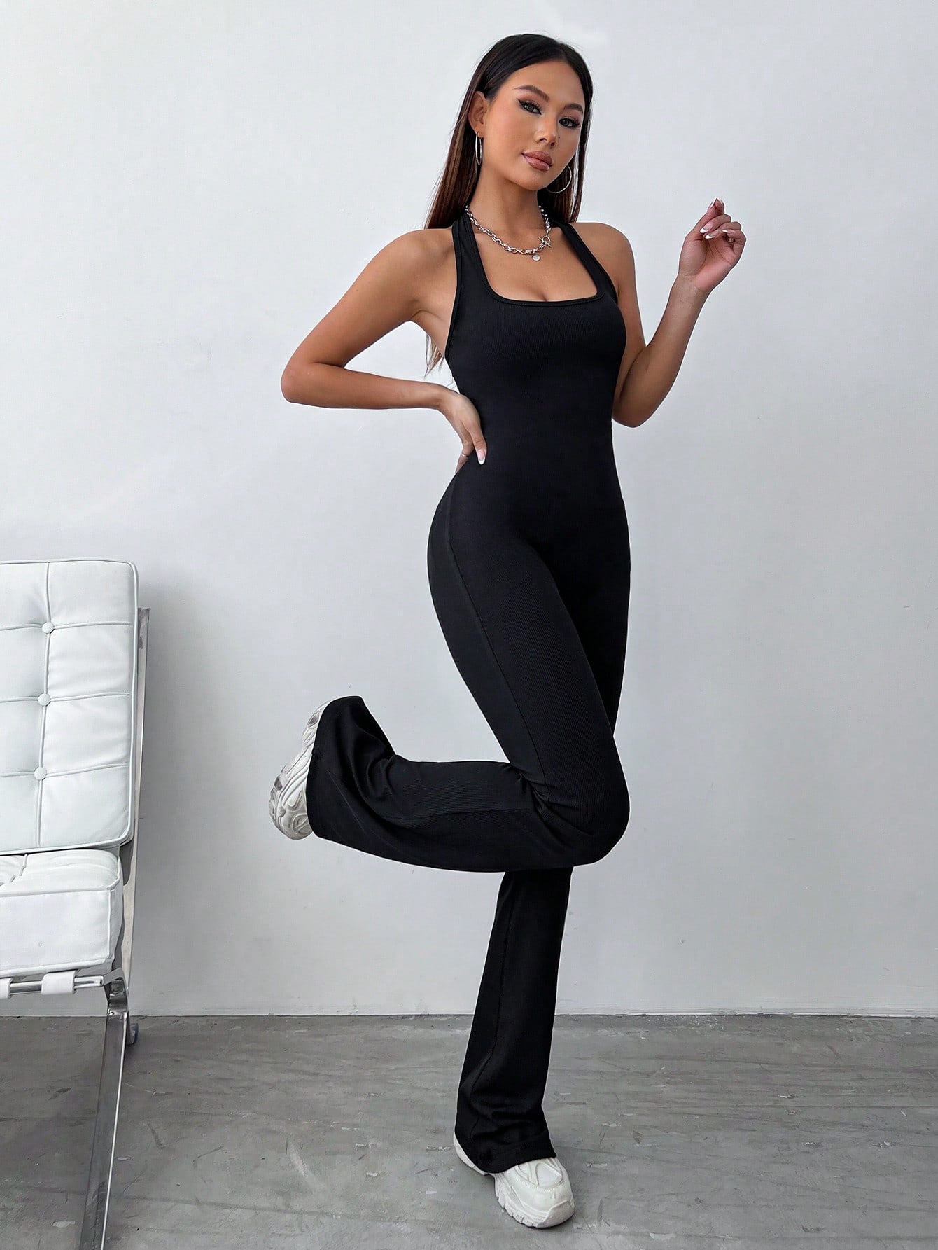 Sleeveless Jumpsuit With Halter Neck And Flared Bottom, Simple And Versatile